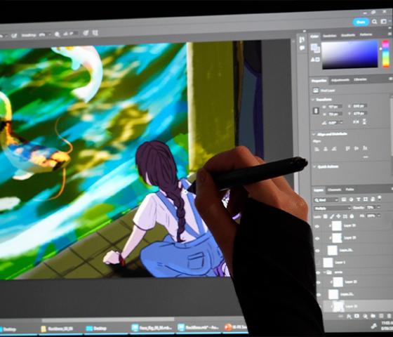 Decorative image - close up of a person working on a digital animation artwork